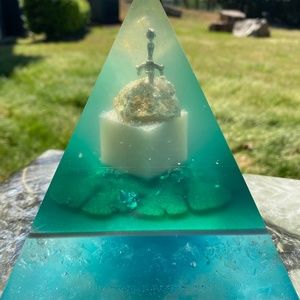 Sword in the stone pyramid art
